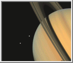 Saturno e dois de seus sat�lites: T�tis e Dione
